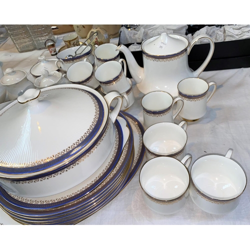 595 - A Paragon Sandringham part dinner and tea service approx. 45 pieces decorated with powder blue and g... 