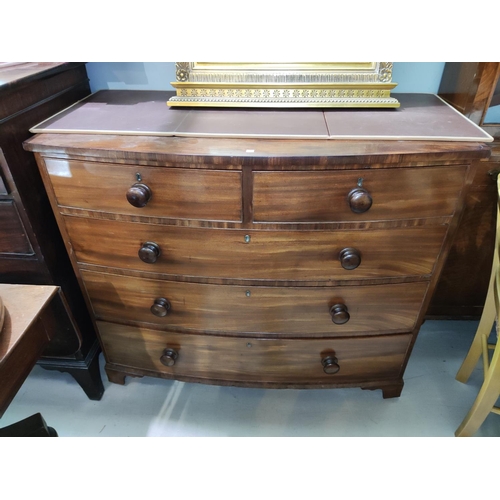 820 - A 19th century mahogany bow front chest of 3 long and 2 short drawers with turned knob handles, on b... 