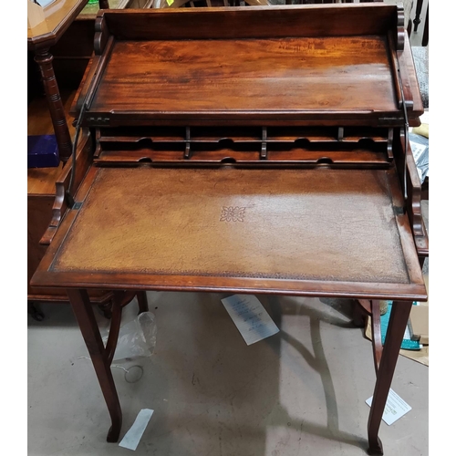 905 - A reproduction fruitwood writing table with hinged slide out writing surface.