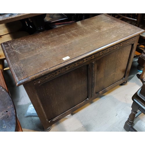 931 - A 1930's carved oak blanket box