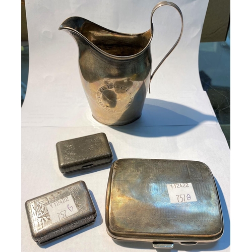 757B - A Georgian hallmarked silver milk jug , a hallmarked silver cigarette case and two other vesta cases