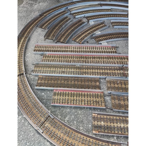 283 - An unusual scratch built 0 gauge train track in circular form with metal stands