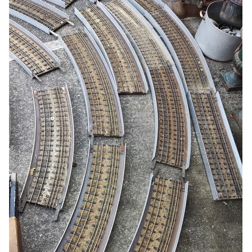 283 - An unusual scratch built 0 gauge train track in circular form with metal stands