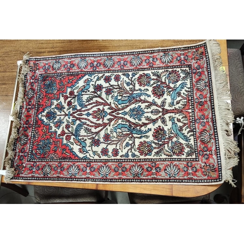 858 - A Middle Eastern hand worn prayer rug.