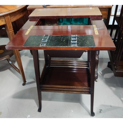 860 - An inlaid mahogany sewing box table with shelf below
