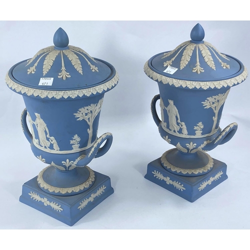 471 - A Wedgwood light blue Jasperware pair of urn shaped vases with covers, height 30 cm