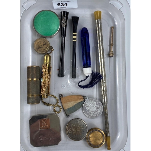 634 - A 1930's telescope cigarette holder and others; an Edwardian gem set retractable tooth pick; compact... 