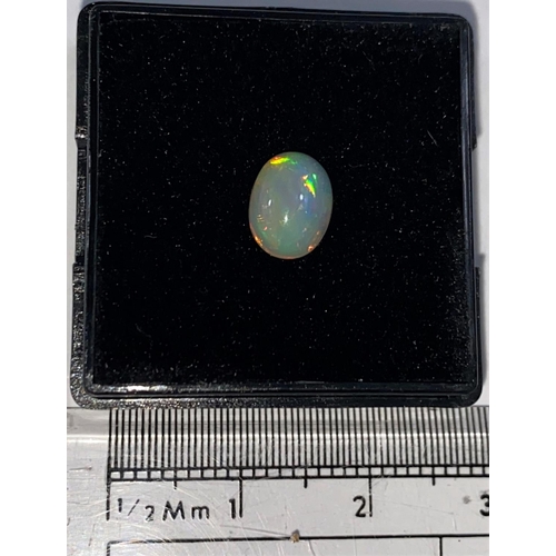 650 - An oval cabochon cut opal, 0.87 carat