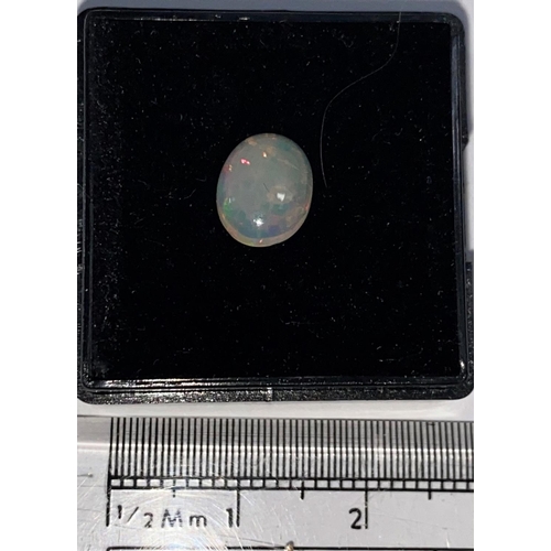 652a - A single cabochon cut opal, 1 carat