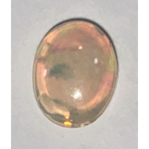652a - A single cabochon cut opal, 1 carat
