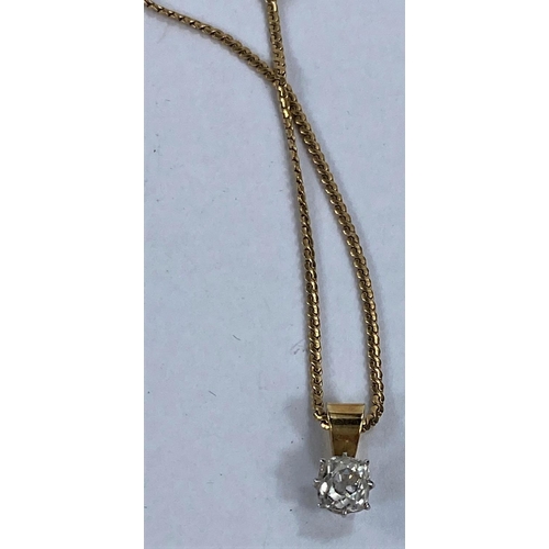688 - A pendant set single rounded rectangular diamond on fine yellow metal chain, stamped '750', 4.8 gm