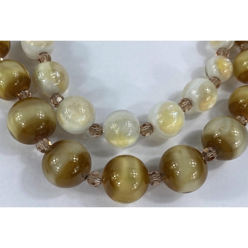 706 - A vintage 1960's satin glass graduating bead necklace by Christian Dior, marked on clasp