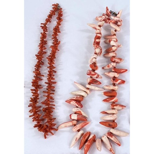 708 - A selection of vintage coral necklaces including one' shark tooth' style