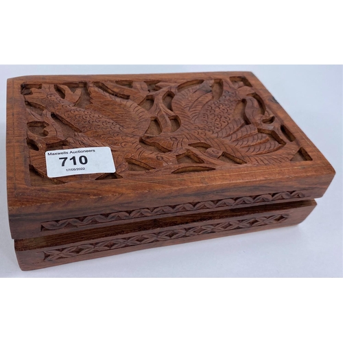 710 - A selection of vintage costume jewellery in carved wood box - includes a netsuke in the form of a ra... 