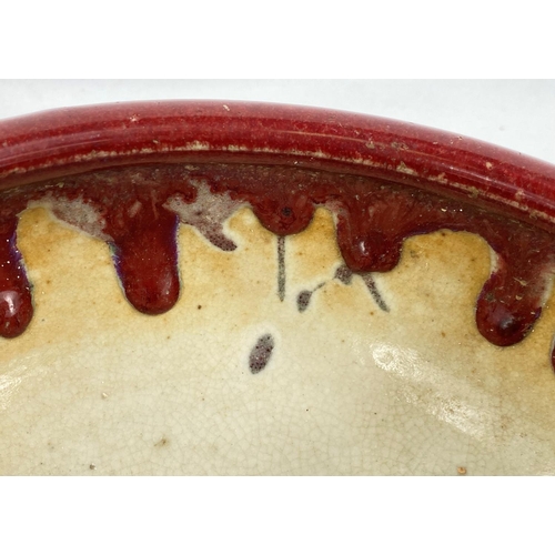 409 - A 19th century, possibly Qing dynasty, Chinese sand de boeuf glaze bowl with drips to the white glaz... 
