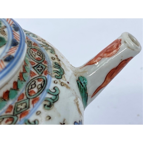 412 - A small Chinese Kangxi famille vert tea pot, length spout to handle 16cm, overall height 10cm