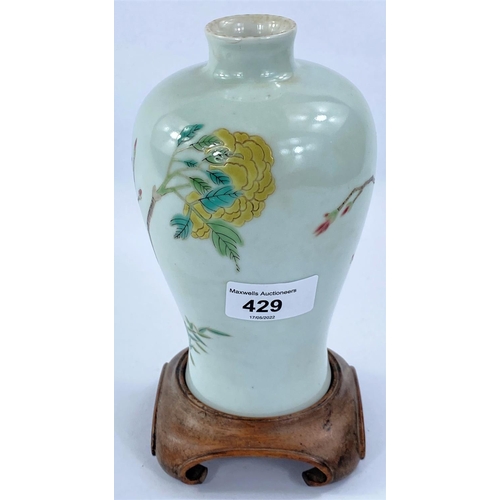 429 - A Chinese porcelain Meiping vase with enamel floral decoration, 17cm, double ring mark to base, hard... 