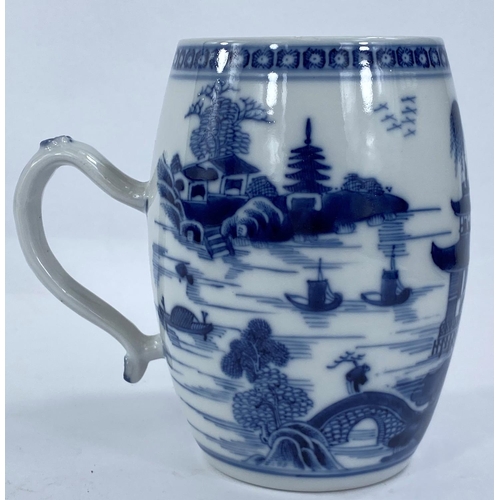 438 - A late 19th/early 20th century Chinese porcelain barrel shaped mug decorated in unglazed blue with p... 
