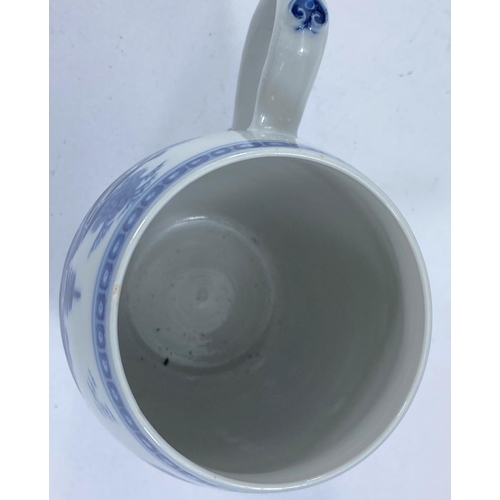 438 - A late 19th/early 20th century Chinese porcelain barrel shaped mug decorated in unglazed blue with p... 