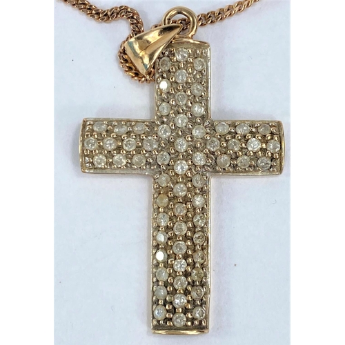 613 - A diamond set 9 carat hallmarked gold cross pendant on fine curb chain stamped 375, 7.6gm