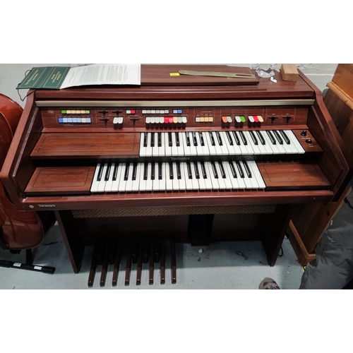 909 - A Technics U30 electric organ with twin keyboard, in mahogany effect case, with stoolThese items hav... 