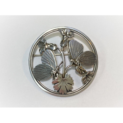726 - Georg Jensen, a 'Moonlight Blossom' silver brooch, 2 butterflies perched on a flowering branch, in p... 