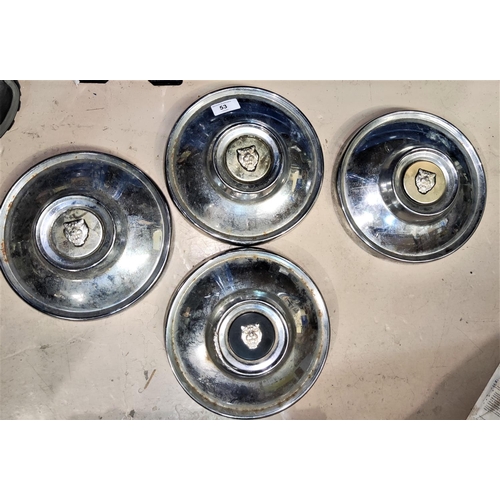 53 - A set of 4 chrome Jaguar hub caps