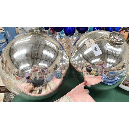 458 - Two large silvered witch's balls