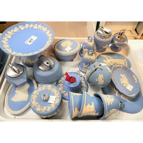 477 - A selection of Wedgwood light blue Jasperware:  bells; covered trinket pots; table lighters; et... 
