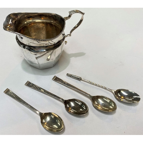 719C - A hallmarked silver cream jug, Birmingham 1922 and 4 hallmarked silver teaspoons 4.5oz