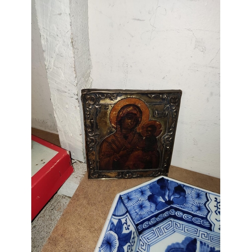 100C - A Virgin and child icon, a piece of Asian metal ware;   a lacquer vase and a Chinese blue and white ... 