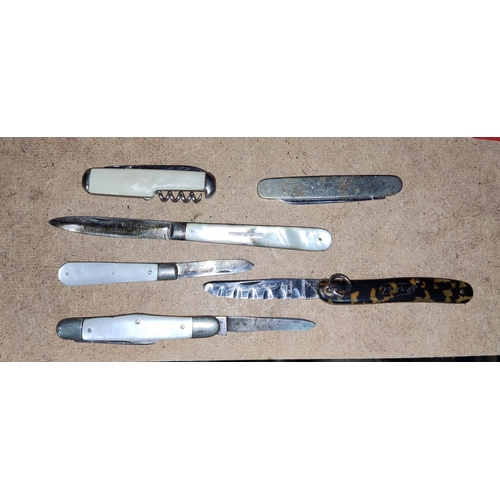 100F - Two pearl handle and hallmarked silver fruit knives and other pocket knives
