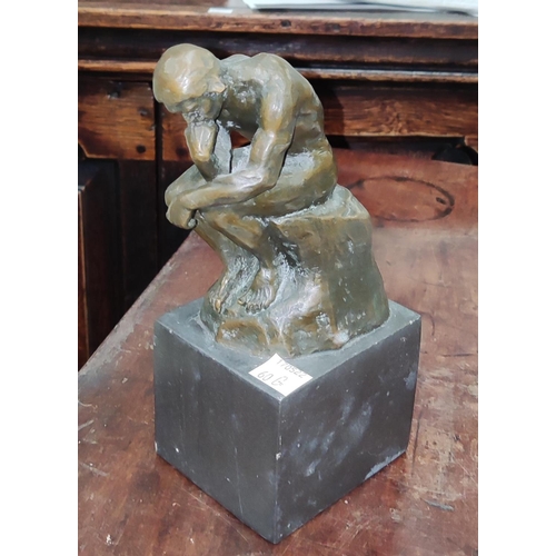60G - A small bronze, after Rodin 'The Thinker' on marble plinth height 19cm