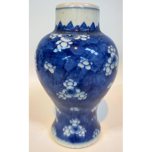 404 - A 19th century Chinese blue and white inverted baluster vase decorated with prunus blossom, height 1... 