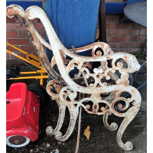 118 - A pair of Victorian cast iron garden bench ends