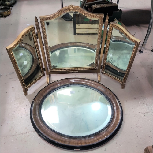 86 - An Edwardian oval wall mirror in wood effect frame; a triple dressing table mirror, gilt framed; etc... 