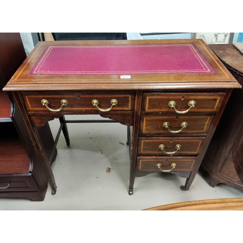 912 - A single pedestal desk with 5 drawers and red leather inset top, drawers and legs and top with inlay... 