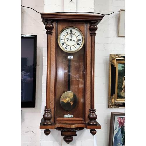 98 - A 19th century Vienna wall clock in walnut case, with double weight driven movement (no pediment)