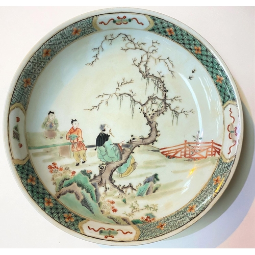 405C - A Chinese famille verte dish decorated with traditional scene, diameter 29cm