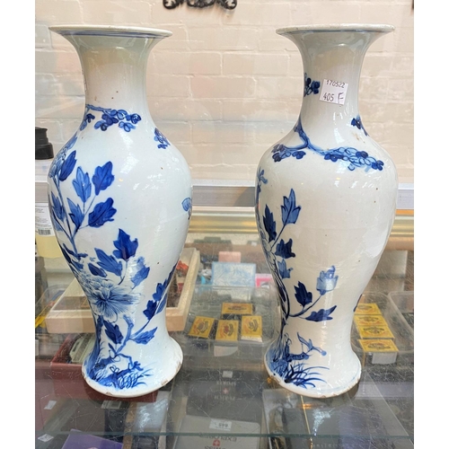 405F - A pair of 19th century Chinese blue and white baluster vases, naturalistic decoration, 4 character m... 