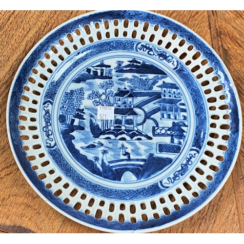 521 - A Chinese blue & white dish with double pierced borders, central traditional scene, 25 cm
