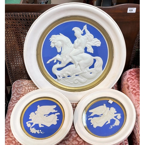 487 - A large and 2 small circular blue and white relief wall plaques, framed and glazed