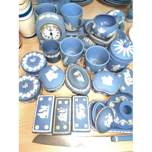 463 - 2 Wedgwood blue Jasperware clocks and other trinketware