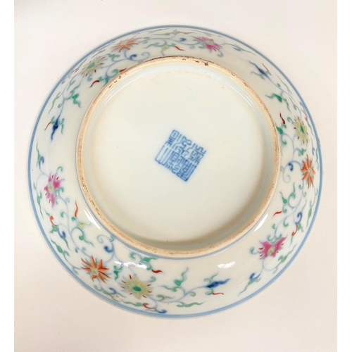 405A - A small Chinese dish with polychrome decoration, seal mark to base 16cm diameter