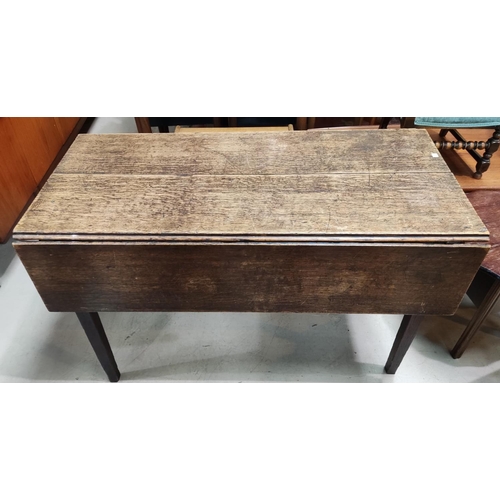 839 - An 18th century oak kitchen table with rectangular drop leaf top, length 115cm