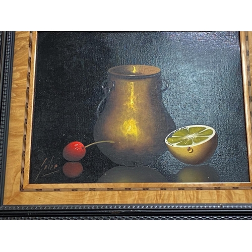 791A - A 20th century still life of 1/2 a lemon, cherry & a vase/cup, a pair of oils on board, signed&n... 