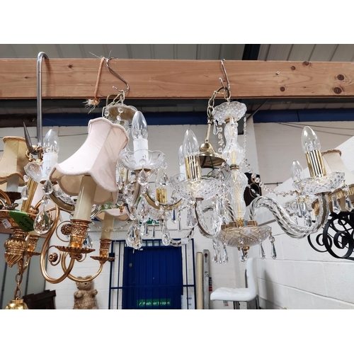112 - 2 gilt metal and glass 5 branch centre lights with glass drops