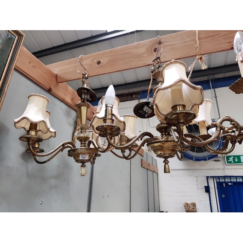 114 - A pair of classical style gilt metal 5 branch centre lights and 2 x 2 branch acanthus wall lights