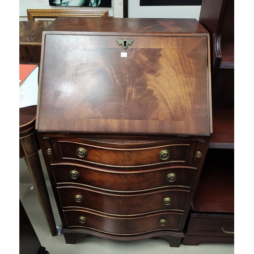 850 - A ladies reproduction mahogany bureau with fall front and 4 drawers