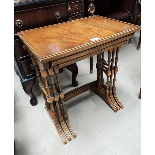 891 - A nest of 3 mahogany trio tables